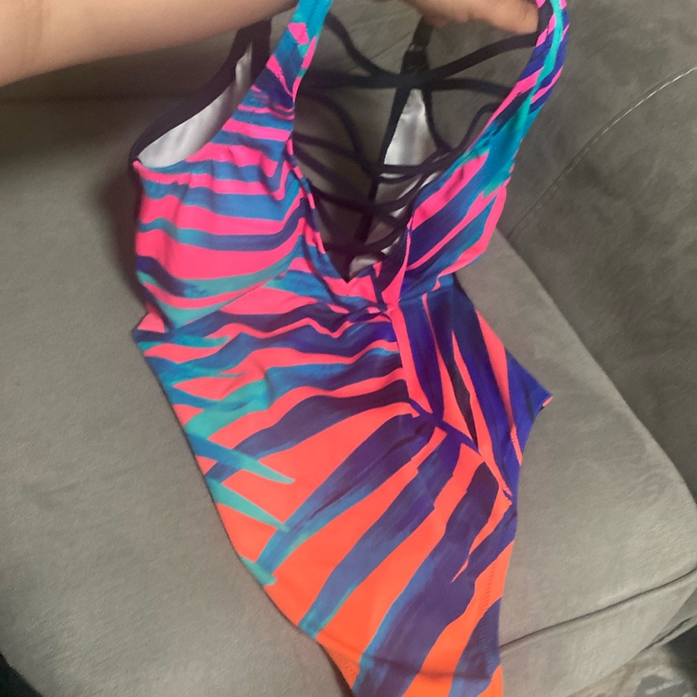 Pink swimming suit large and wear meadium